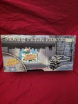 Vtg 2001 Mr. Christmas Moving Film Picture Projector All Year Lighting System. Fixed Price $55.72.